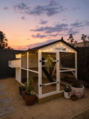 Castle Coop in a backyard with fairy lights